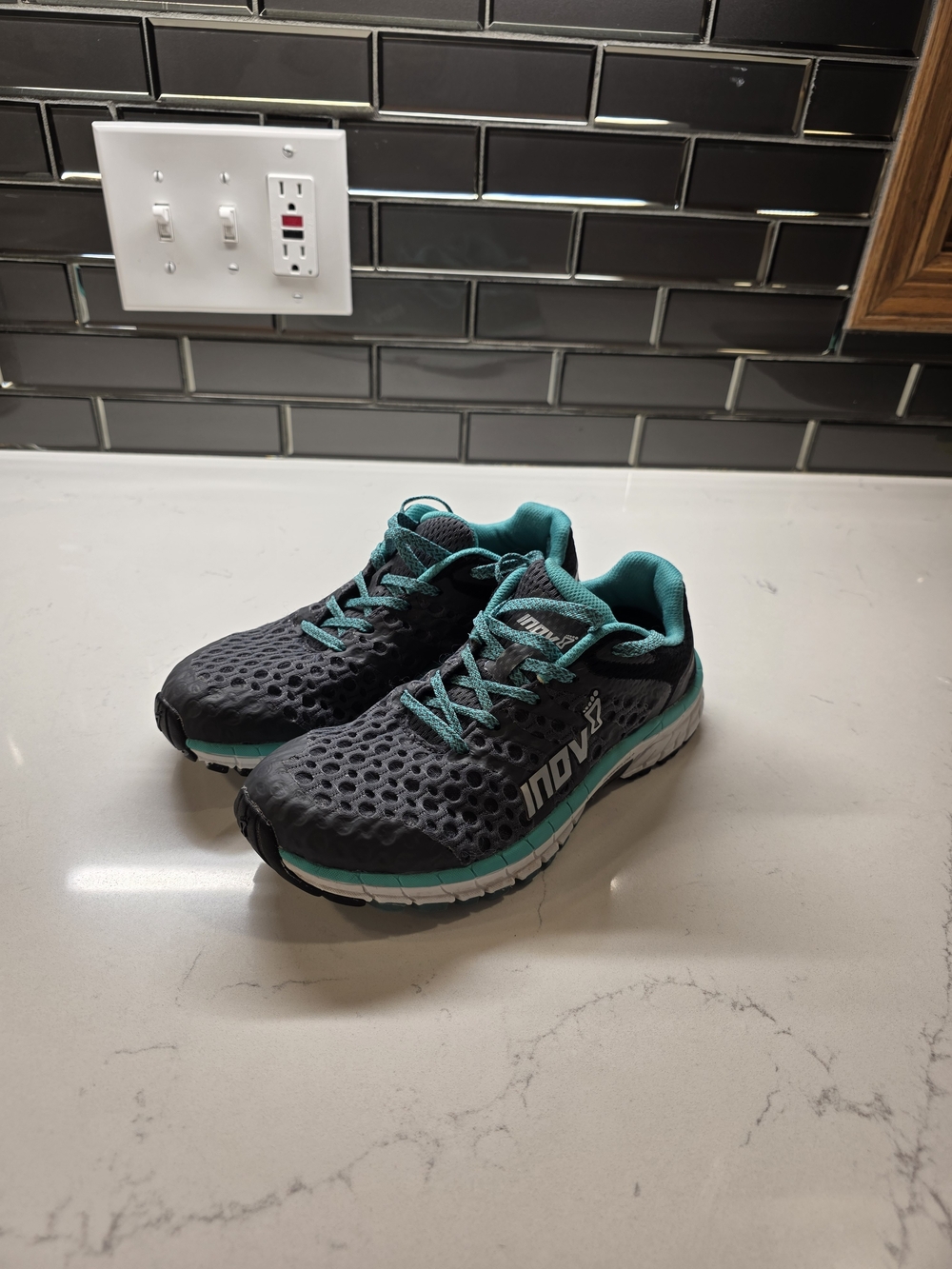 Inov-8 Roadclaw 275 V2 running shoe in a grey and teal In Women's Size 7